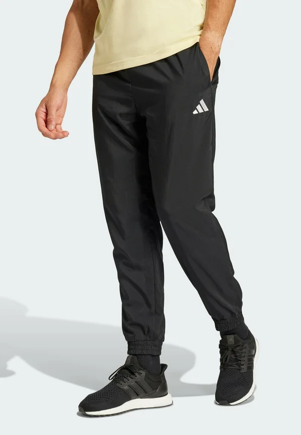 ESSENTIALS SMALL STANFORD - Jogginghose - black   white