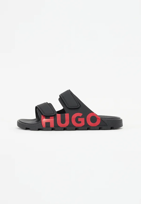 EVANDER - Pantolette flach - black