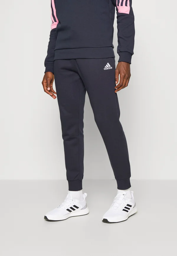 FEELCOZY - Jogginghose - legend ink/white