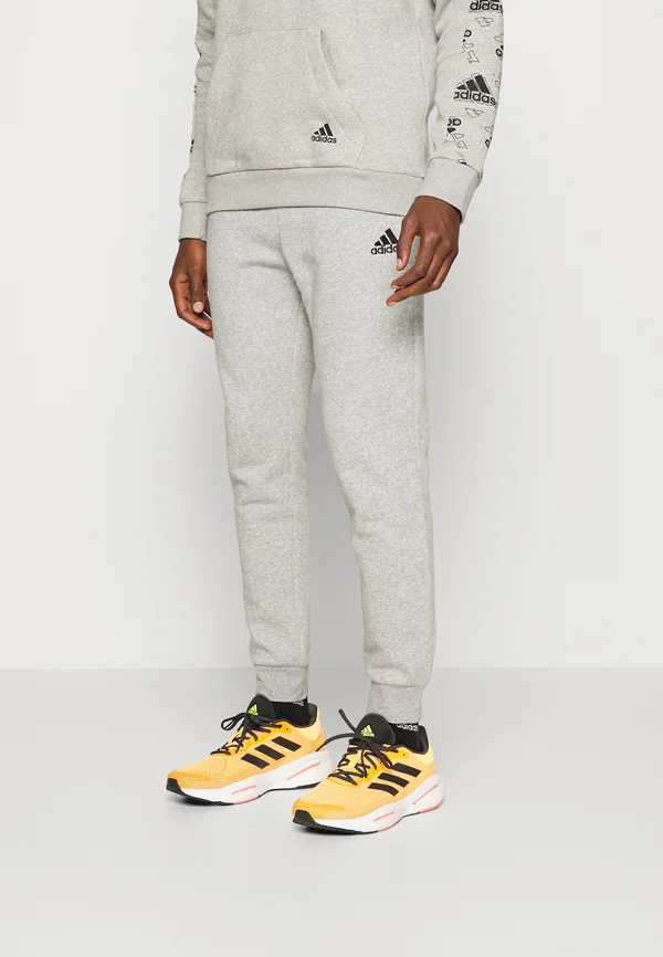 FEELCOZY - Jogginghose - medium grey heather/black