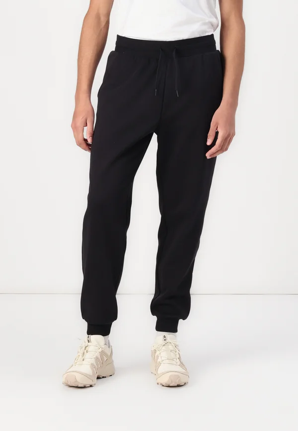 FINE REGULAR TAPERED - Jogginghose - black