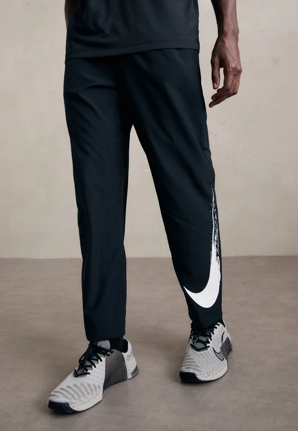 FORM PANT - Jogginghose - black/white