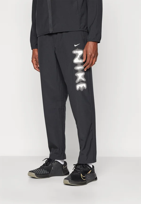 FORM PANT - Jogginghose - black/white