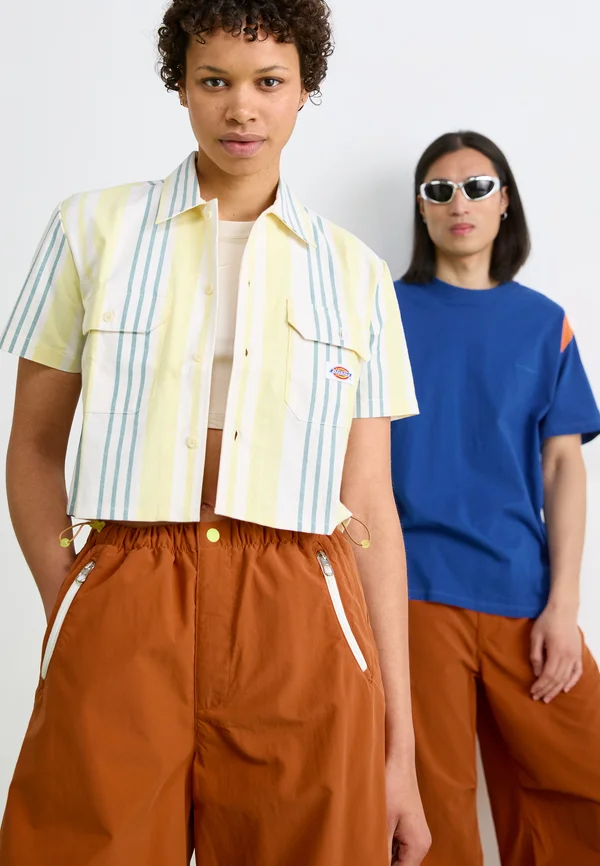 FROG PARACHUTE PANT UNISEX - Stoffhose - dark russet/lemon twist