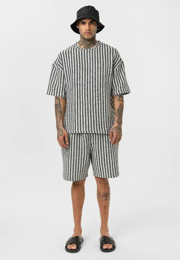 GIJS - Jogginghose - black