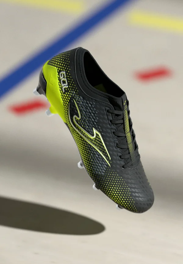 GOL - Fußballschuhe für festen Untergrund - black/fluor yellow