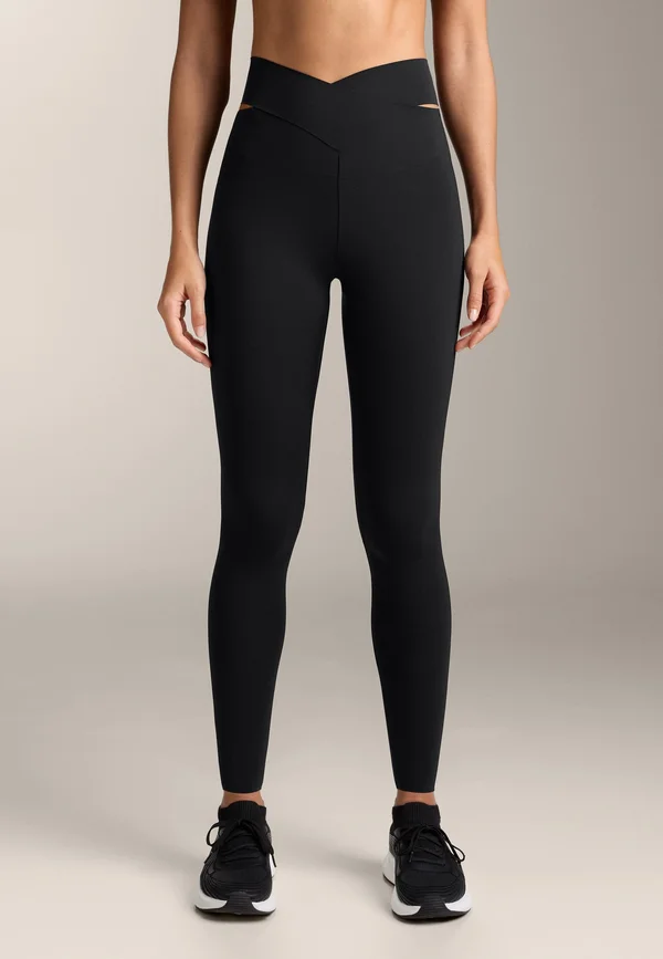 HIGH RISE COMPRESSIVE ANKLE-LENGTH WITH CUT OUT WAIST 33761254 - Tights - black