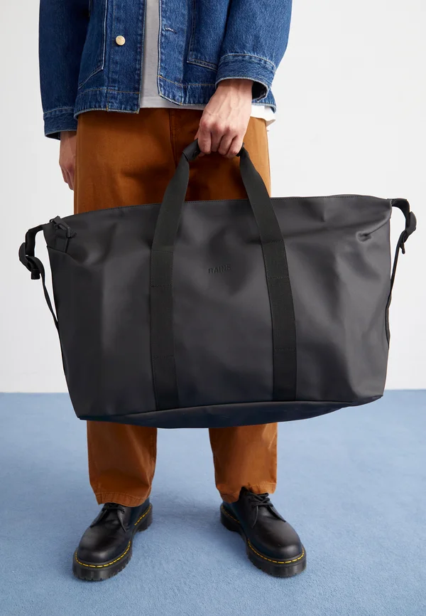HILO BAG UNISEX - Reisetasche - black