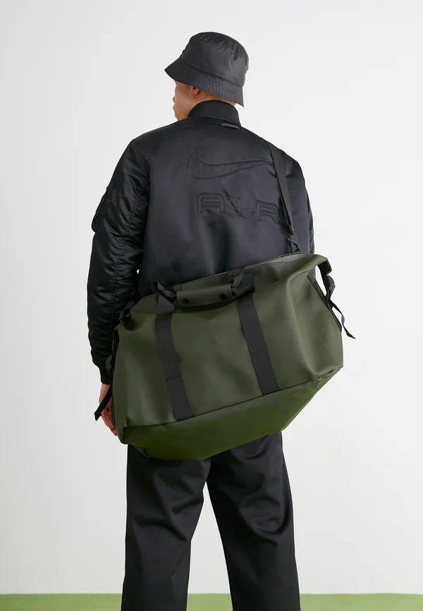 HILO BAG UNISEX - Reisetasche - green