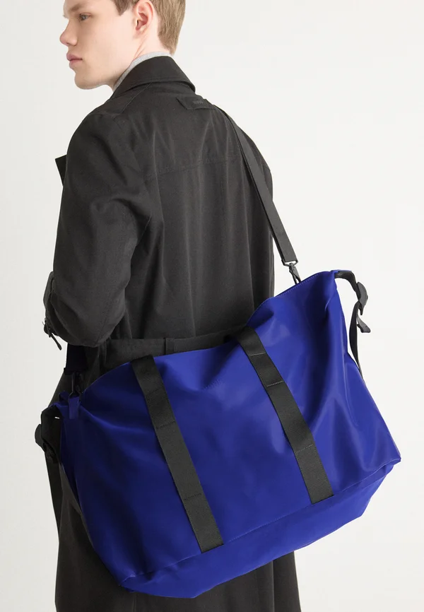 HILO BAG UNISEX - Reisetasche - parade