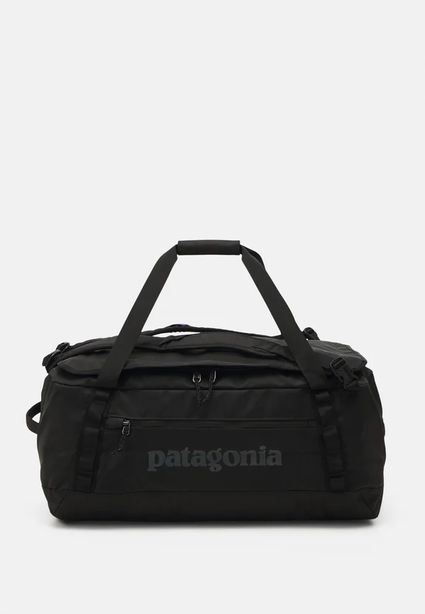 HOLE  - Reisetasche - black