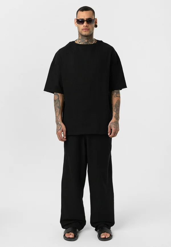 IVO - Jogginghose - black