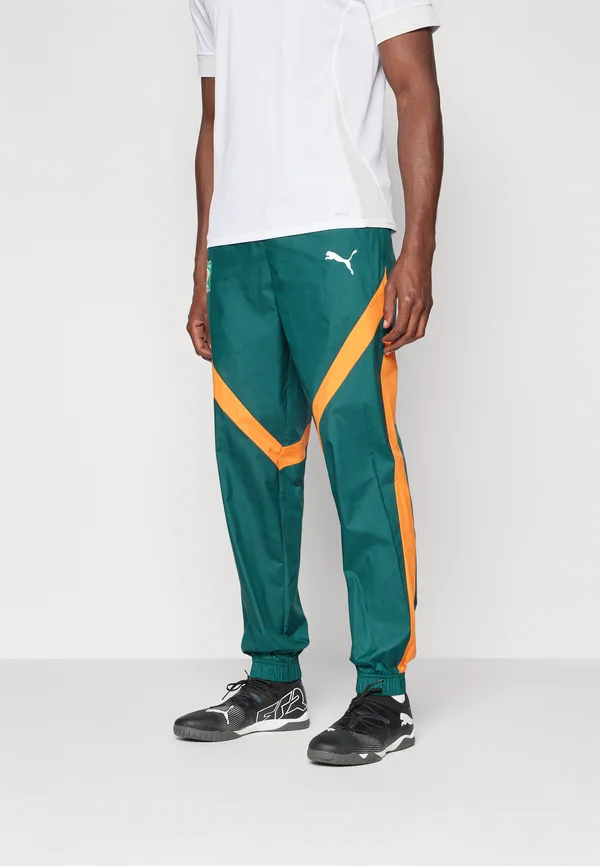IVORY COAST FIF PREMATCH WOVEN PANT - Nationalmannschaft - dark myrtle/rickie orange