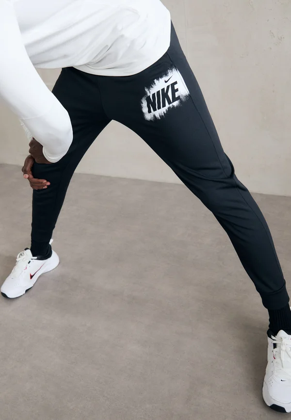 JOGGER - Jogginghose - black