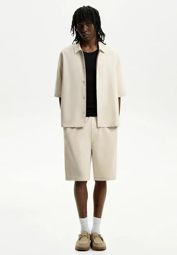 JOGGER TAILORED - Jogginghose - beige