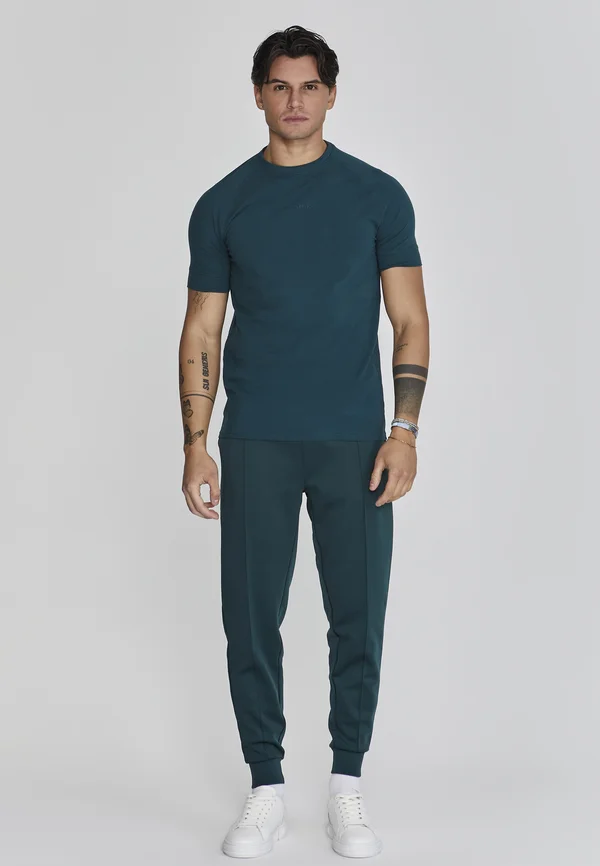 JOGGERS - Jogginghose - green