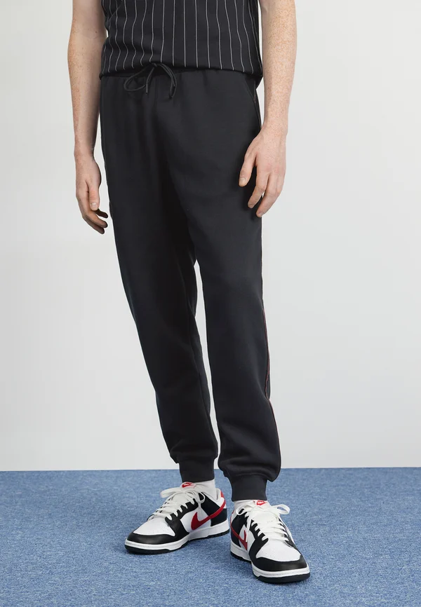 Jogginghose - black/dune red