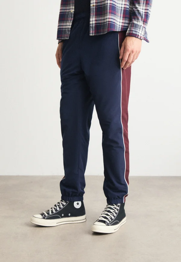 Jogginghose - bleu marine bordeaux