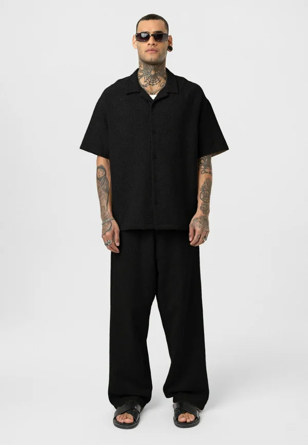 JOHN - Jogginghose - black