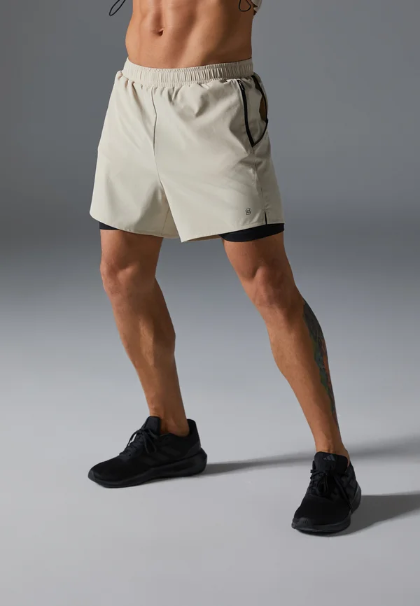Kurze Sporthose - beige