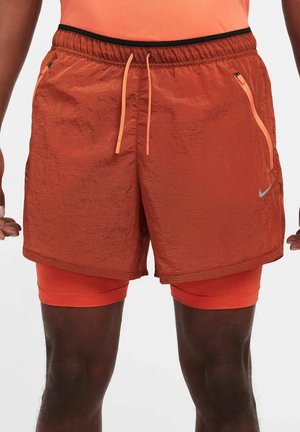 Kurze Sporthose - light wild mango