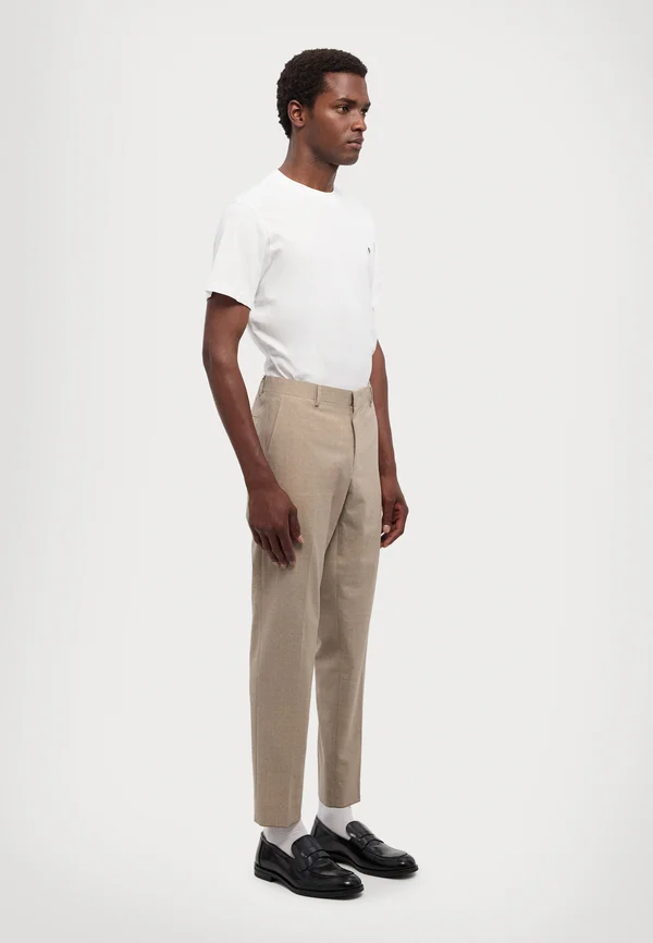 LIGHT TRAVEL PANT - Anzughose - beige