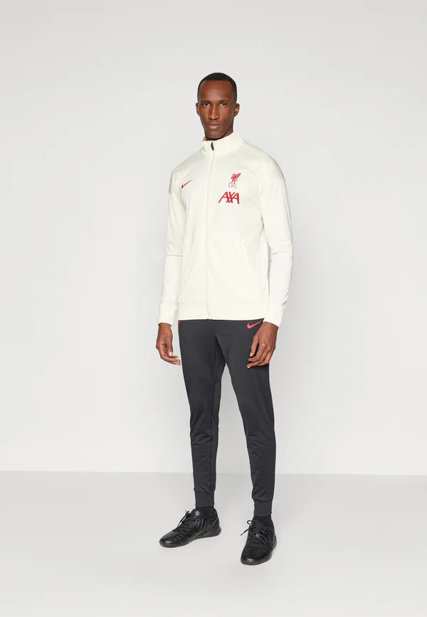 LIVERPOOL FC M NK DF STRK TRK SUIT K SE - Vereinsmannschaften - coconut milk/black/gym red
