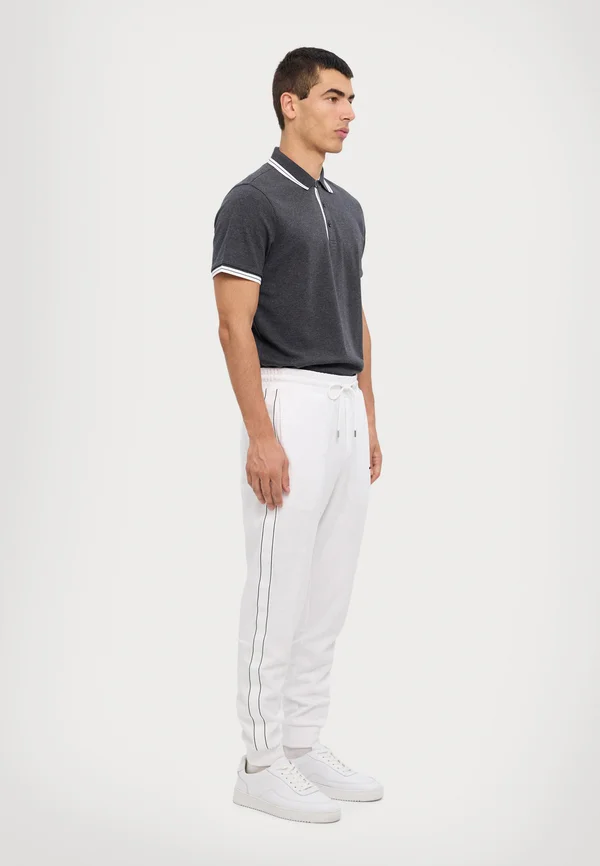 LOGO TAPE PANT - Jogginghose - white