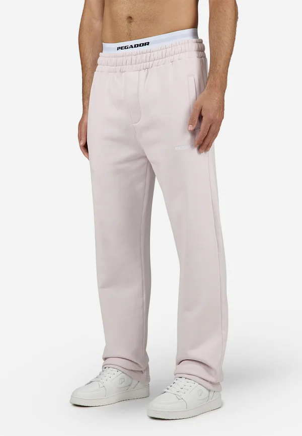 LOGO WIDE PANTS - Jogginghose - washed light lilac/white gum