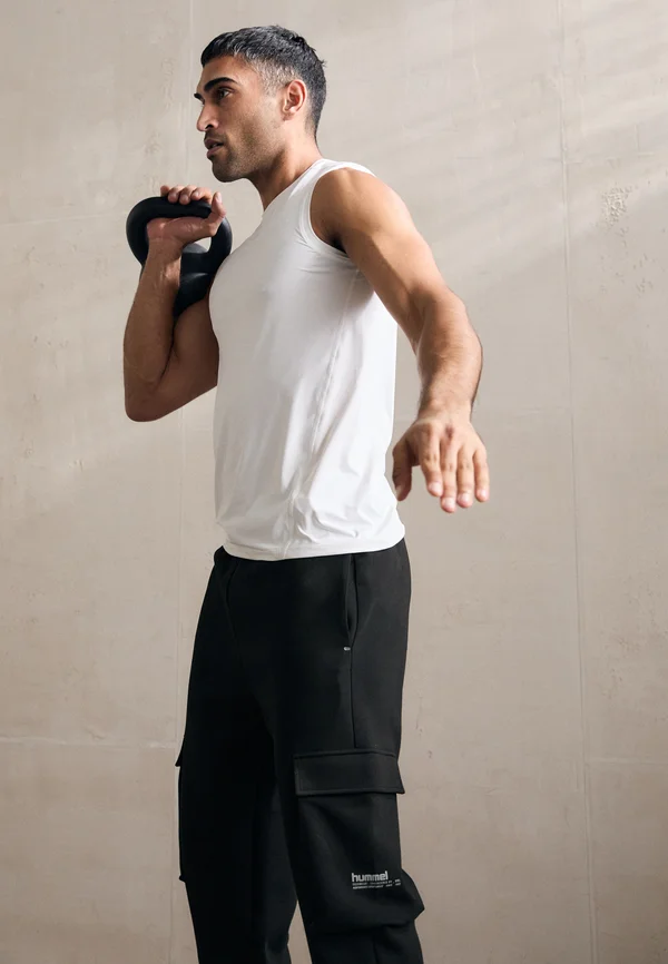 LOOSE CARGO PANTS - Jogginghose - black