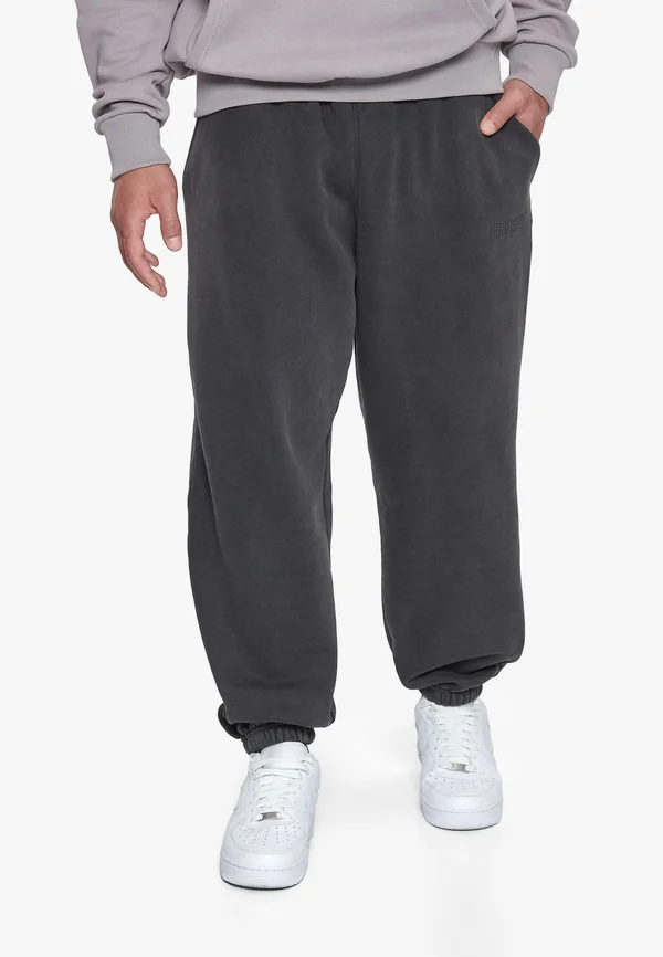 LOOSE FIT  - Jogginghose - acid washed black