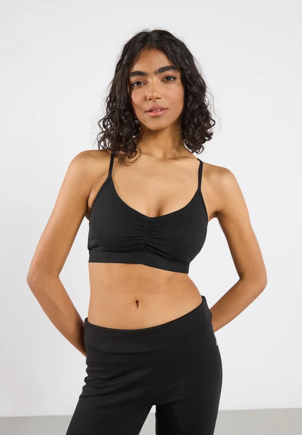 LOW SUPPORT SPORTS BRA WITH FRONT RUCHING AND CROSS BACK - Sport-BH mit mittlerer Stützkraft - black
