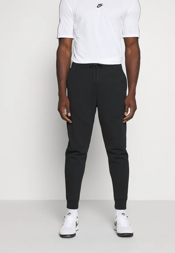 M NSW TCH FLC JGGR - Jogginghose - black