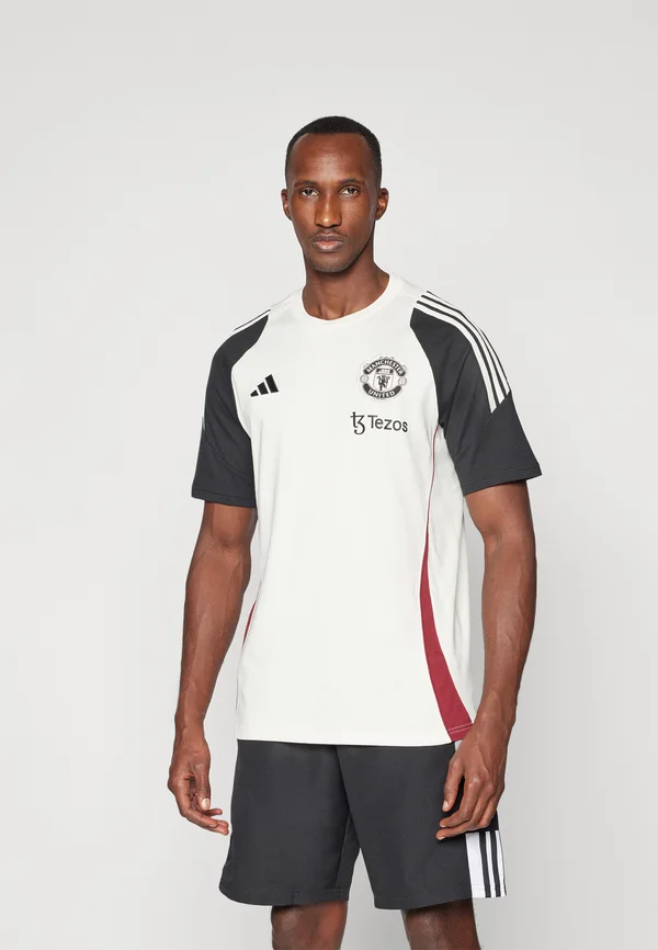 MANCHESTER UNITED TIRO - T-Shirt print - off white/black