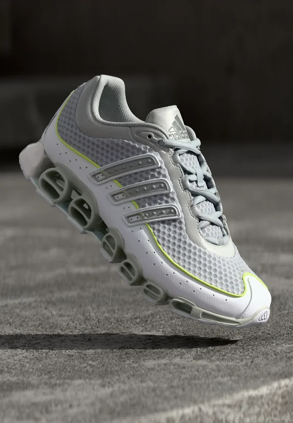 MEGARIDE UNISEX - Sneaker low - silver metallic/footwear white/solar yellow