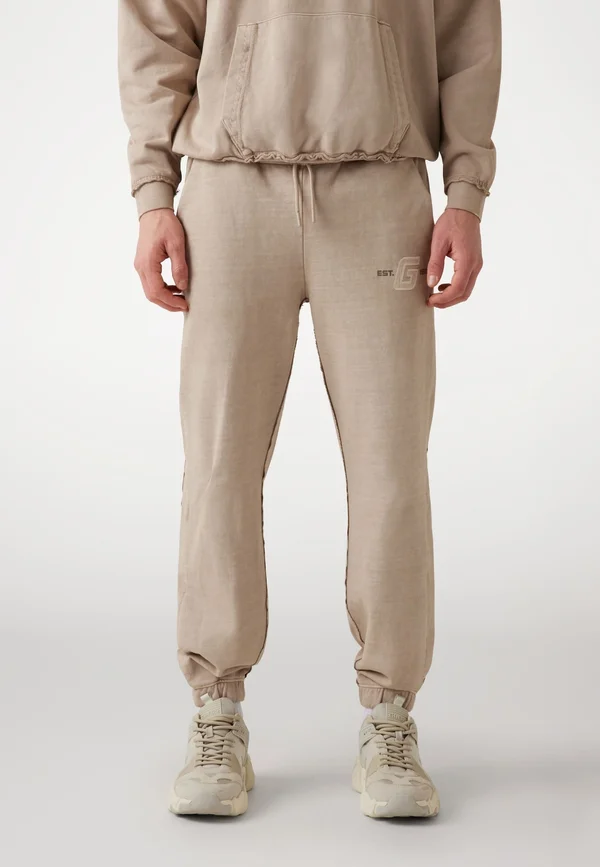 MIT BÜNDCHEN - Jogginghose - beige