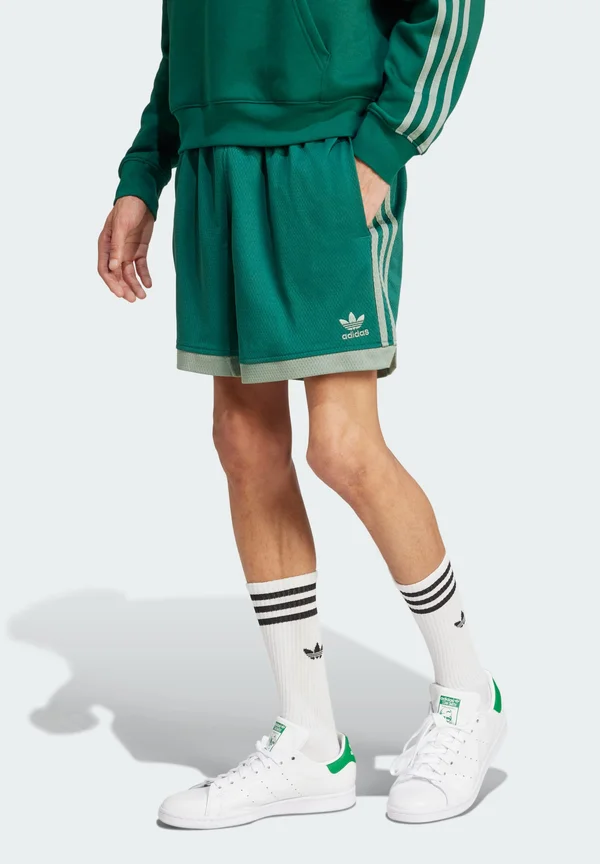 MOCK EYELET - Jogginghose - collegiate green