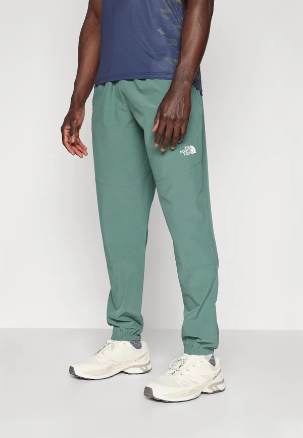 MOUNTAIN ATHLETICS WIND PANT - Outdoor-Hose - duck green