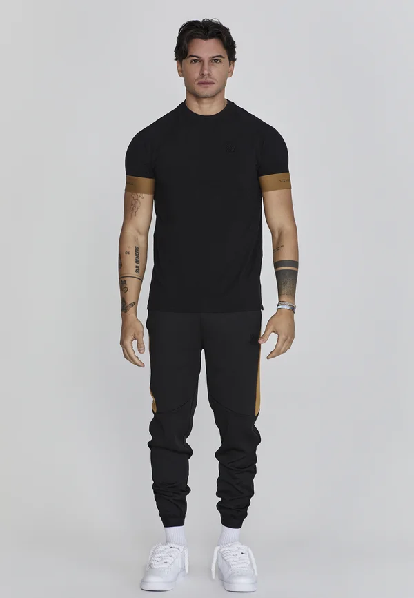 MUSCLE FIT JOGGERS - Jogginghose - black