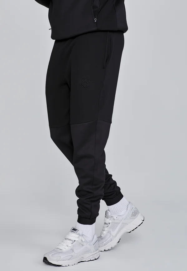 MUSCLE FIT JOGGERS - Jogginghose - black