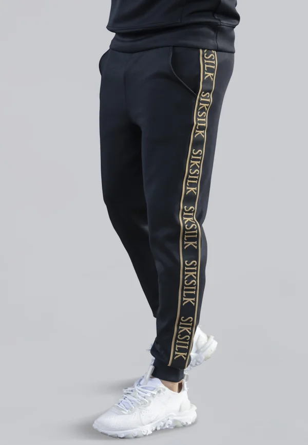MUSCLE FIT JOGGERS - Jogginghose - black