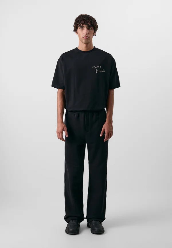 NADIYA UNISEX - Jogginghose - black