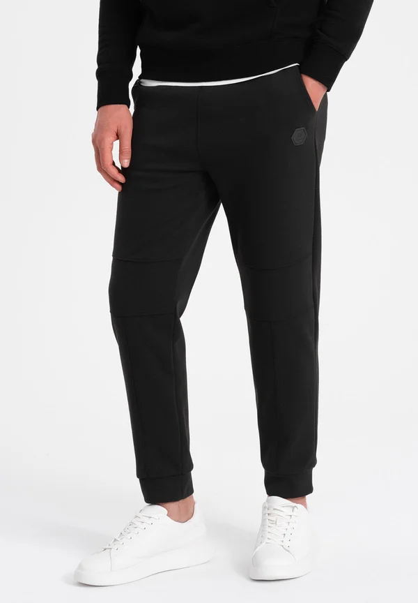 OM PASK - Jogginghose - black