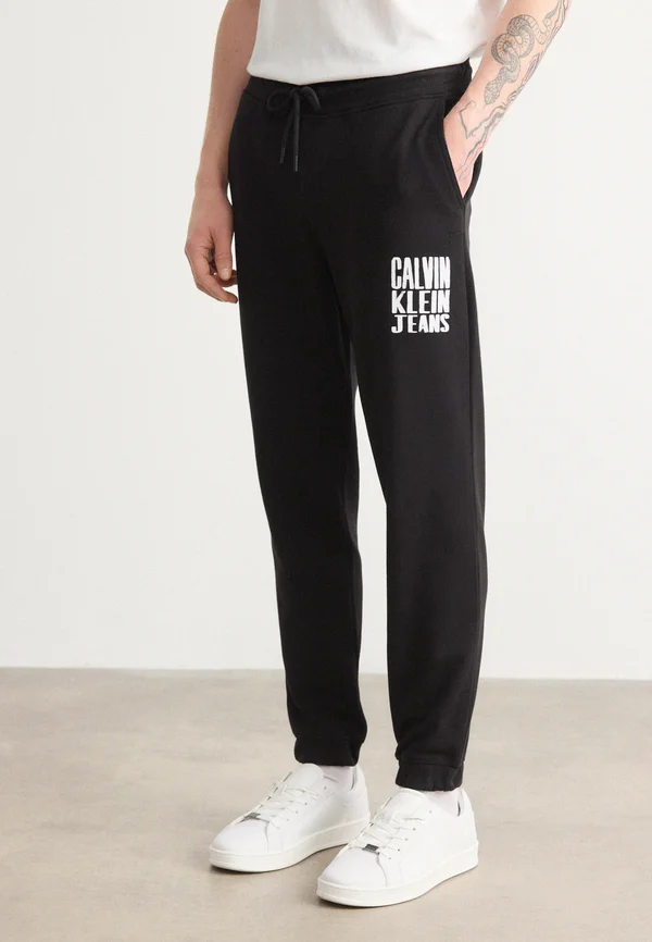 PAINTED - Jogginghose - black