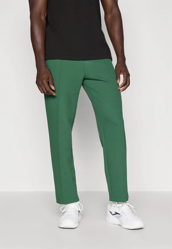 PANT HERITAGE - Jogginghose - green