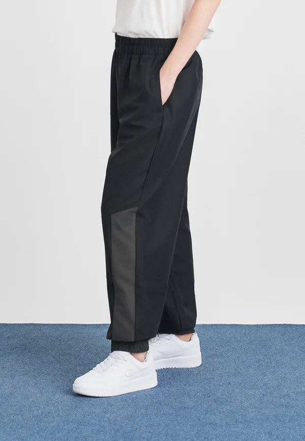 PANT - Jogginghose - black