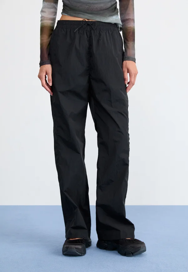 PANT - Jogginghose - black