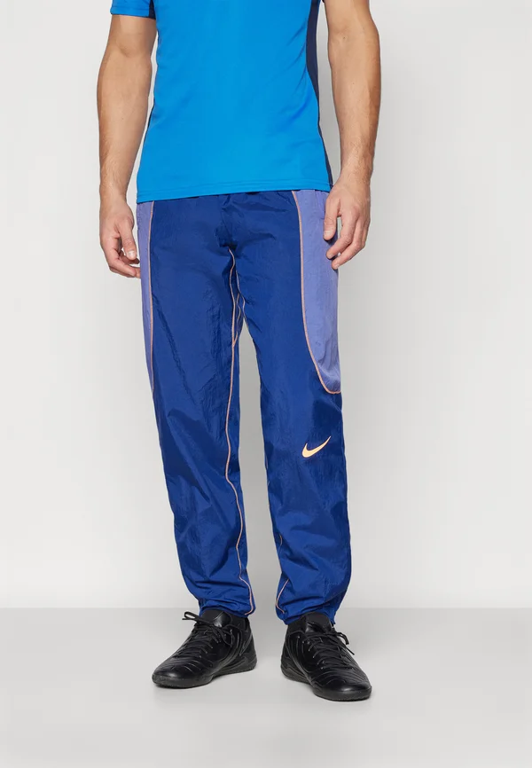 PANT - Jogginghose - blue void/purple dust/orange pulse