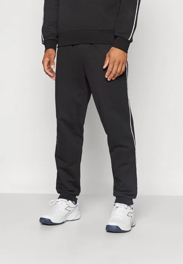 PANT TAPE - Jogginghose - black