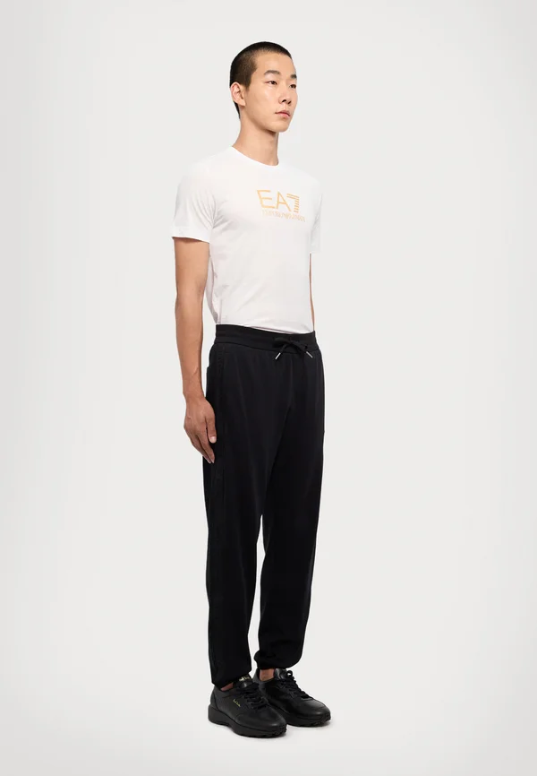 PANTALONI - Jogginghose - black
